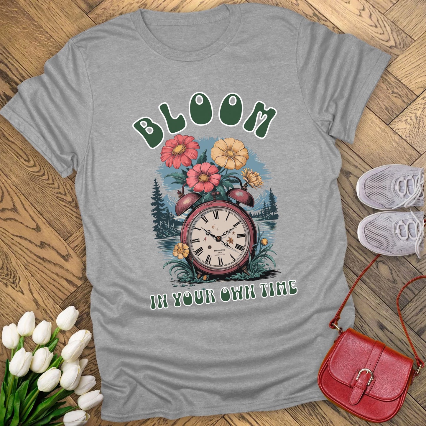 Bloom in your own time t-shirt.