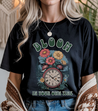 Bloom in your own time t-shirt.